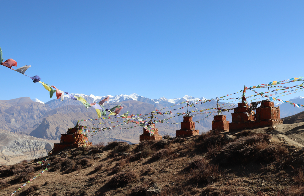 Chortens on hills seen while on Upper Mustang jeep tour