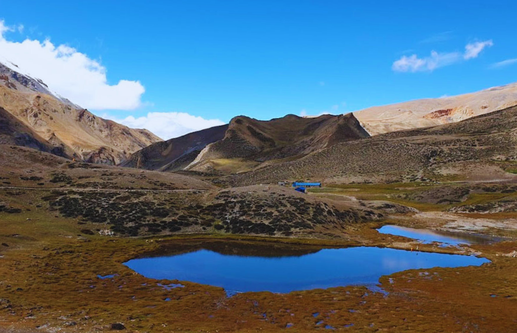 the holy Damodar Kunda Lake during the Upper Mustang trek in Nepal