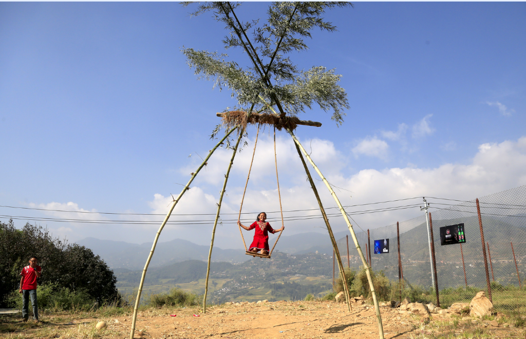 Playing swing in village during tihar in nepal