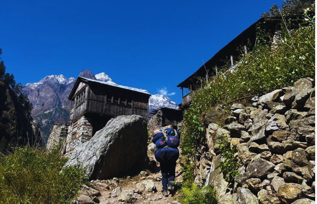Our experienced porter on the way to Manaslu Circuit Trek